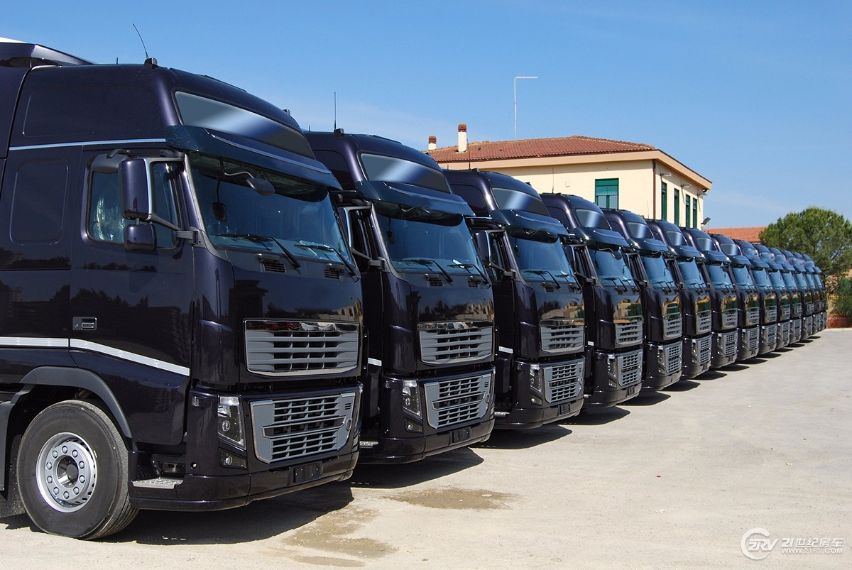 bigstock-Corporate-Fleet-Trucks-Lined-85362254.jpg